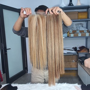 Vente en gros d'extensions de cheveux humains vierges paquets de vison brut et de Remy vietnamien en couleur prix - Product Image 1