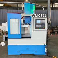Centre d'usinage vertical CNC VMC300 3 axes, 4 axes pour le traitement des métaux