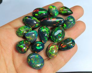Merveilleux cabochon d'opale noire éthiopienne forme ovale brillant arc-en-ciel flashy pierre précieuse d'opale noire éthiopienne au prix de gros - Product Image 6