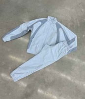 Mode coupe-vent survêtement imperméable coupe-vent deux pièces veste et pantalon ensemble pour la course à pied randonnée et la performance athlétique