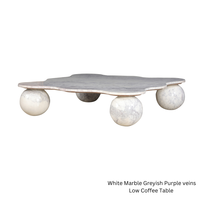 Table basse sculpturale moderne en marbre naturel ORRIS LIVING, plateau artistique, base de luxe, mobilier de salon