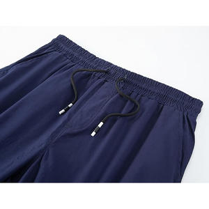 กางเกงวิ่งขาย่นสำหรับผู้ชายผ้าคอตตอนลายทแยง2025โลโก้ระบายอากาศได้ดีผ้าคอตตอนกลางปักสีทึบสำหรับกีฬากลางแจ้ง - Product Image 4