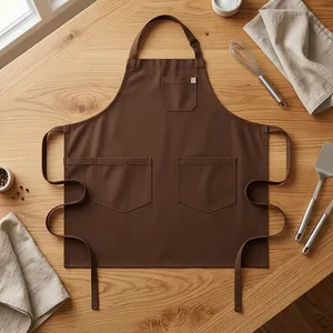 Delantal Clásico de Lona Marrón Resistente y Reutilizable sin Mangas con Múltiples Bolsillos para Artículos de Limpieza - Product Image 1