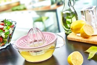 Presse-agrumes manuel multifonctionnel Afossa en cristal transparent pour citron et orange, base antidérapante, ergonomique, écologique, versement facile