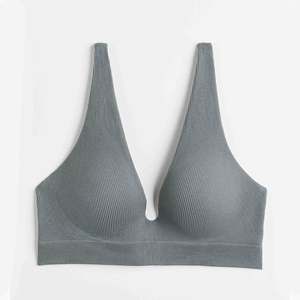 Soutien-gorge de sport de yoga à séchage rapide respirant et confortable pour femmes ensembles de deux pièces personnalisés en vert grande taille sans couture - Product Image 1