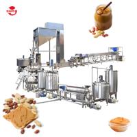 Ligne de production entièrement automatique à haute efficacité en acier inoxydable de qualité alimentaire pour la transformation des noix, du beurre, des arachides, des amandes et des noisettes