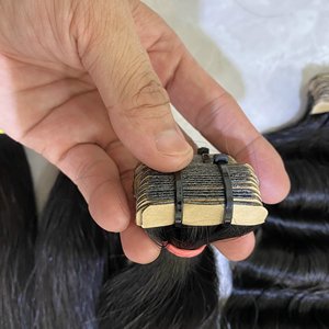 Vente en gros 100% naturel brut vietnamien bouclés Extensions de cheveux humains vierge frisé bande en 100% cheveux synthétiques vagues boucles perruques - Product Image 4