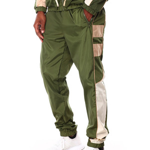 Chándal personalizado ligero de poliéster barato de fábrica para hombre, chándal Unisex para hombre, chándal cortavientos, ropa deportiva, conjunto de chándal para correr - Product Image 4