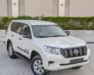 Precioso Prado TX 2024 Blanco, 2.7L Gasolina, Asientos de Tela, Sistema de Navegación Bluetooth, Volante a la Izquierda, 18 Ruedas, 7 Plazas, Automático - Product Image 1