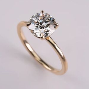 Bague de fiançailles personnalisée en argent 925, moissanite ronde de 7 mm, sertie à griffes, plaquée rhodium, pour occasion de mariage - Product Image 1