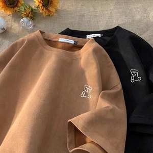 เสื้อยืดผ้าฝ้ายแท้สีขาวสีดำล้วนพิมพ์ลายกราฟิก OEM 100% เสื้อยืดแขนสั้นใช้ได้ทั้งผู้ชายและผู้หญิง - Product Image 1