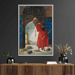 Toile imprimée : Décoration murale turque par Osman Hamdi, « Le dresseur de tortues », encadrée de blanc - Product Image 1
