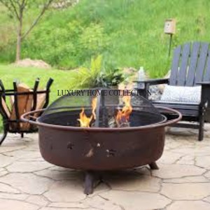 Rustic farmhouse metal <b>fire</b> <b>pit</b> with barnwood style accents blending beautifully into country themed outdoor living spaces - Product Image 1