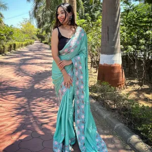 Presenting The pure simmer slub silk Saree With Beautiful multi stich viscose thread work in all over the saree also attached