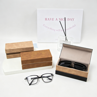 Étui à lunettes pliable magnétique fait main en cuir PU de qualité supérieure avec plumes bleues, boîte à lunettes semi-rigide, logo personnalisé, vente en gros