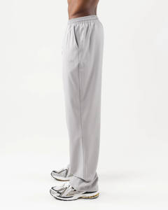 OEM Vente en gros Logo personnalisé pour hommes Jogging d'entraînement à jambe droite Pantalon en polyester, nylon Pantalon ample Pantalon de survêtement de sport pour hommes - Product Image 5