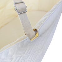 Lit bébé en coton biologique, tissu respirant à couches d'air, design ovale, sangles réglables, matelas en fibre de coco, fabricant OEM