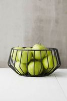 Panier rond décoratif de fil de fer d'organisateur de cuisine noire avec de l'or pour le stockage de légumes de fruits