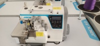 Machine à coudre surjeteuse industrielle à 4 fils JACK C4 avec coupe-fil automatique d'occasion