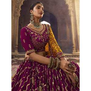 Magnifique Lehenga Choli de mariage en viscose et soie brodée de couleur violette - Product Image 1