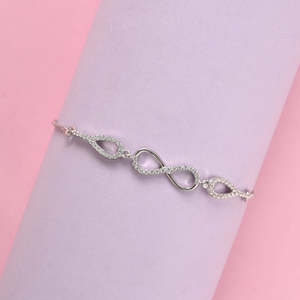 NOVAMART Fine Rhodium-Plated Diamond/Ruby Butterfly <b>Infinity</b> <b>Bracelet</b>- 925 Pure Silver Wholesale Export - Product Image 3