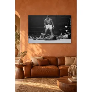 Impression sur toile Fida : Muhammad Ali noir et blanc debout au-dessus de son adversaire dans le ring - Product Image 2
