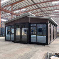 Maison conteneur mobile modulaire préfabriquée de luxe à 2 chambres, extensible, pliable, de 30 pieds, pour habitation, pavillon, école, centre commercial