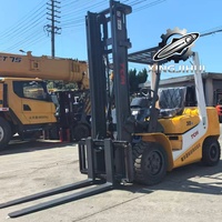 Chariot élévateur diesel d'occasion TCM FD30T6 avec hauteur de levage de 4000 mm et accessoire de déplaceur latéral fonctionnel