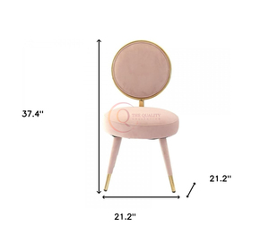 Silla minimalista rosa de felpa con respaldo circular enmarcado en oro y patas cónicas que añaden un toque de glamour y elegancia. - Product Image 2