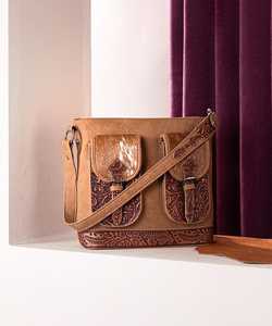 กระเป๋าหนังแท้สไตล์วินเทจสำหรับผู้หญิง งานฝีมือประณีต ตกแต่งพู่ห้อย ลายดอกไม้สลัก  พร้อมช่องซ่อนของ  ขายดี - Product Image 2