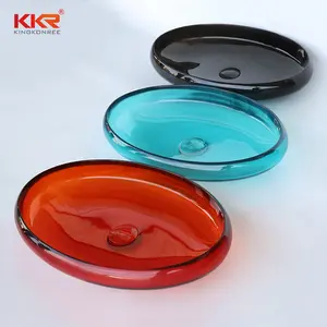 Kingkonree芸術的な透明なカラフルな洗面器創造的なバスルームデザインのためのユニークな透明な樹脂のカウンタートップシンク