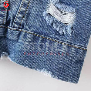 แจ็กเก็ตผ้ายีนส์ตัวยาวของผู้หญิงที่มีรูขาดและมีพู่ดีไซน์เทรนด์แฟชั่นยุโรปและอเมริกาตามสั่ง - Product Image 4