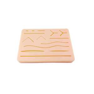 Almohadilla de sutura profesional para entrenamiento médico Almohadilla de silicona realista, duradera y reutilizable con kit de sutura de diseño de 3 capas - Product Image 1