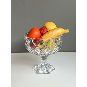 Ciotola di frutta in vetro con piedi