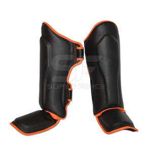 Espinilleras de boxeo transpirables con ajuste flexible y correas de gancho y bucle ajustables Espinilleras de boxeo con capas de espuma adicionales - Product Image 1