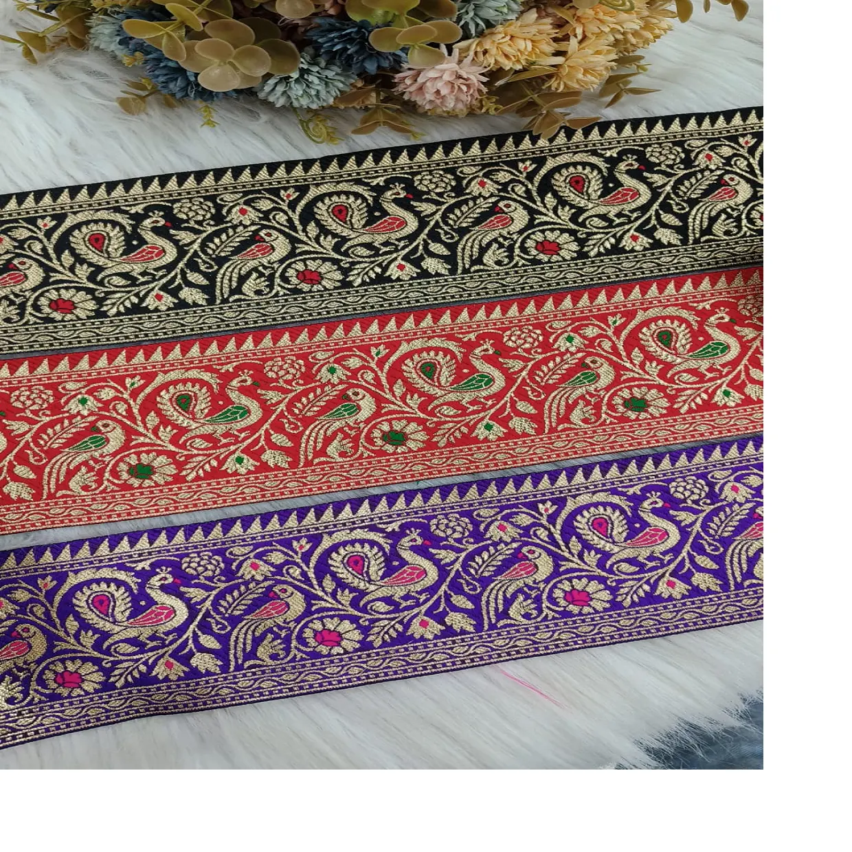 custom made machine embroidered laces in paisley design for wedding dresses in red & black and blue colours for resale.