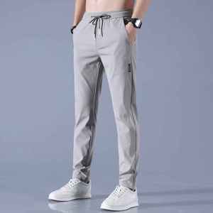 Pantalones casuales elásticos de seda helada para hombre, pantalones deportivos transpirables rectos holgados de tendencia fina de verano, pantalones deportivos para hombre, nueva moda - Product Image 4