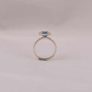 Fashionable Solitaire Blue Emerald Cut Lab Grown Diamond With Tiny Round Cut Diamond Halo Engagement Ring in 18KT <b>Solid</b> Gold - Product Image 6