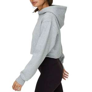 Diseño personalizado 100% algodón cómodo invierno Crop Top Sudadera con capucha con logotipo frontal secado rápido y características ecológicas para mujeres - Product Image 3