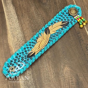 สร้อยข้อมือหนังแท้สำหรับผู้หญิงสายรัดข้อมือทำจากหนังมีปุ่มโลหะโดดเด่นทันสมัย - Product Image 1