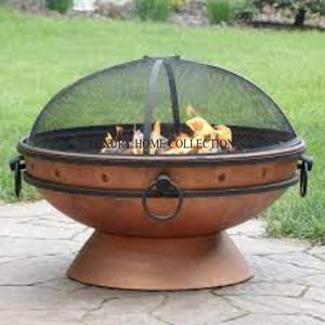 Decorative cutout metal <b>fire</b> <b>pit</b> with intricate laser engraved patterns creating mesmerizing flames and visual ambiance outdoors - Product Image 1