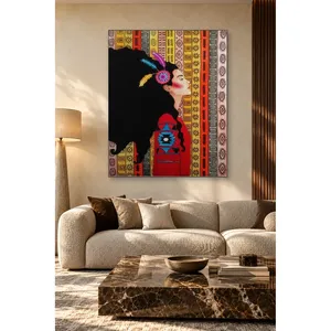 Fida Woman with Feathered Hair in Front of Ethnic Patterns <b>Canvas</b> Print - Product Image 1