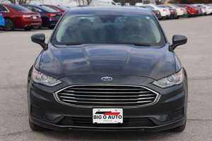 Offres Spéciales Ford Fusion AWD SE 4 portes berline Turbo 2020 d'occasion Sièges en cuir Toit ouvrant de croisière ACC intérieur foncé disponible maintenant en vente - Product Image 4