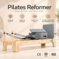 Reformer Pilates multifonction en chêne avec tour de poulies pour la musculation, le fitness et les séances de yoga