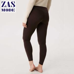 Pantalon de sport décontracté uni sans couture taille basse, effet push-up, coupe droite pour femme, couleur pêche, legging de yoga à coupe régulière - Product Image 1