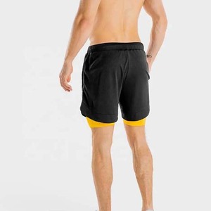 กางเกงขาสั้นสำหรับออกกำลังกายในฤดูร้อนของผู้ชายกางเกงขาสั้นผ้าฝ้ายสีดำเหลืองยืดได้มีลายสีพื้นมี6XL 2025สั่งผลิตได้ตามต้องการ - Product Image 3