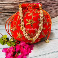 Nouvel arrivage de sac ethnique de travail de broderie dorée fait à la main pour femmes cadeau de mariage beau sac de travail brodé Potli pour femmes