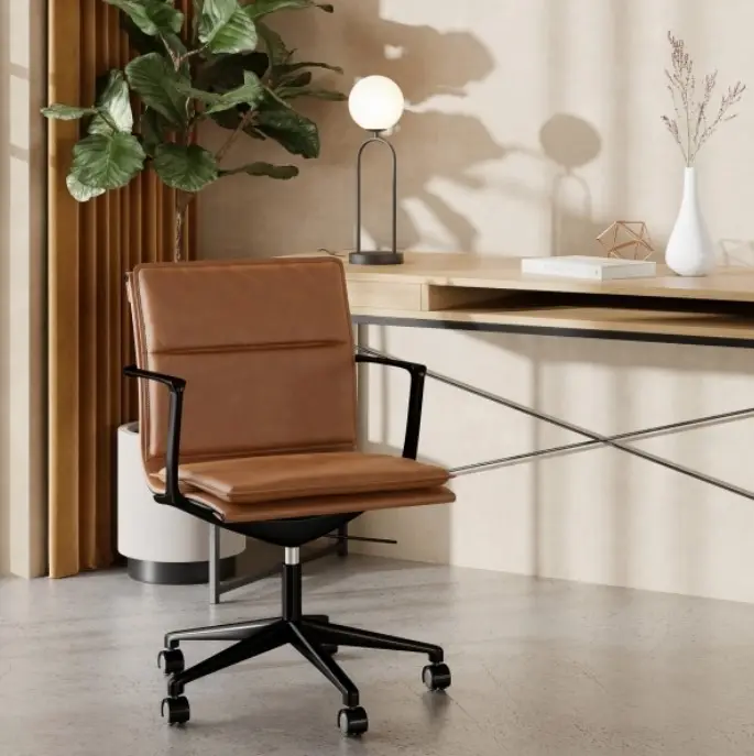 Enigmatic vintage tan and black office chair