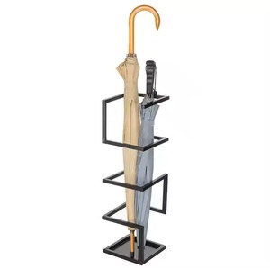 Compact and sturdy metal <b>umbrella</b> <b>stand</b> ideal for <b>indoor</b> placement in homes foyers or commercial spaces - Product Image 4