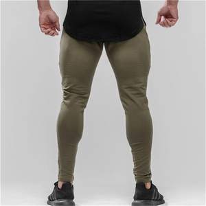 กางเกงจ็อกเกอร์ผ้าฝ้ายมีซิปพิมพ์โลโก้ล่าสุด ทรงสลิมฟิต สีเทา สำหรับออกกำลังกาย ขายส่งสำหรับผู้ชายและผู้หญิง - Product Image 2